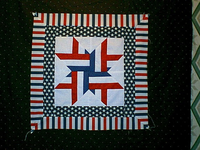 Center block is named "Ribon Star" from a pattern published on the internet. Photographed before quilted. 