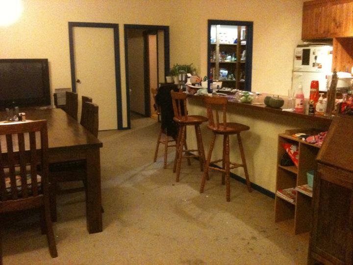 Lounge/dining looking toward the kitchen. Under bench painted, still waiting for benchtop to be stained, kitchen cupboards to be painted and wooden flooring to be laid...