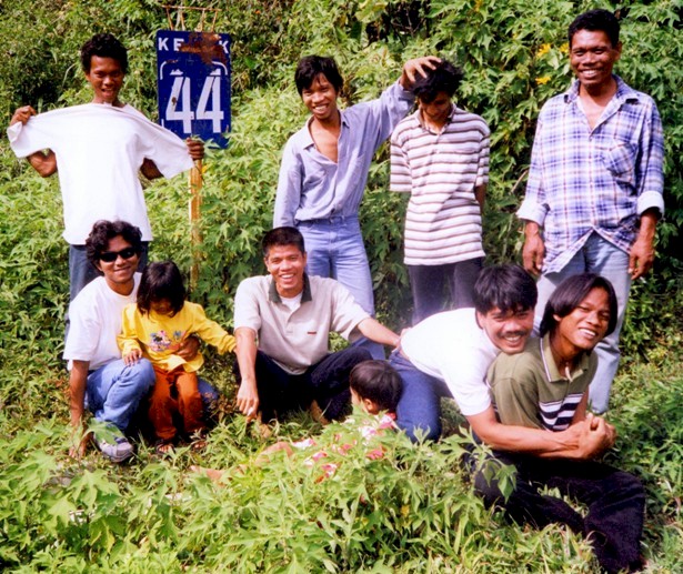 On an expedition from Padang to Lake Maninjau in West Sumatra, by hired Kijang (atoyota [a 'palindrome'] people-carrier). For most - the first time ever outside Padang City. At hairpin bend #44 on a precipitous mountain road.