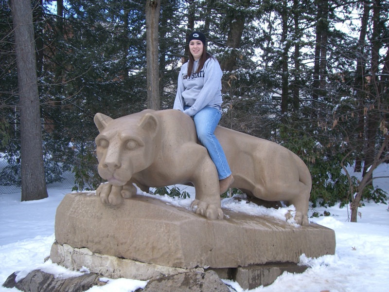 My oldest daughter Chelsea sitting atop the Penn State University Nittany Lion (their mascot) Winter 2007