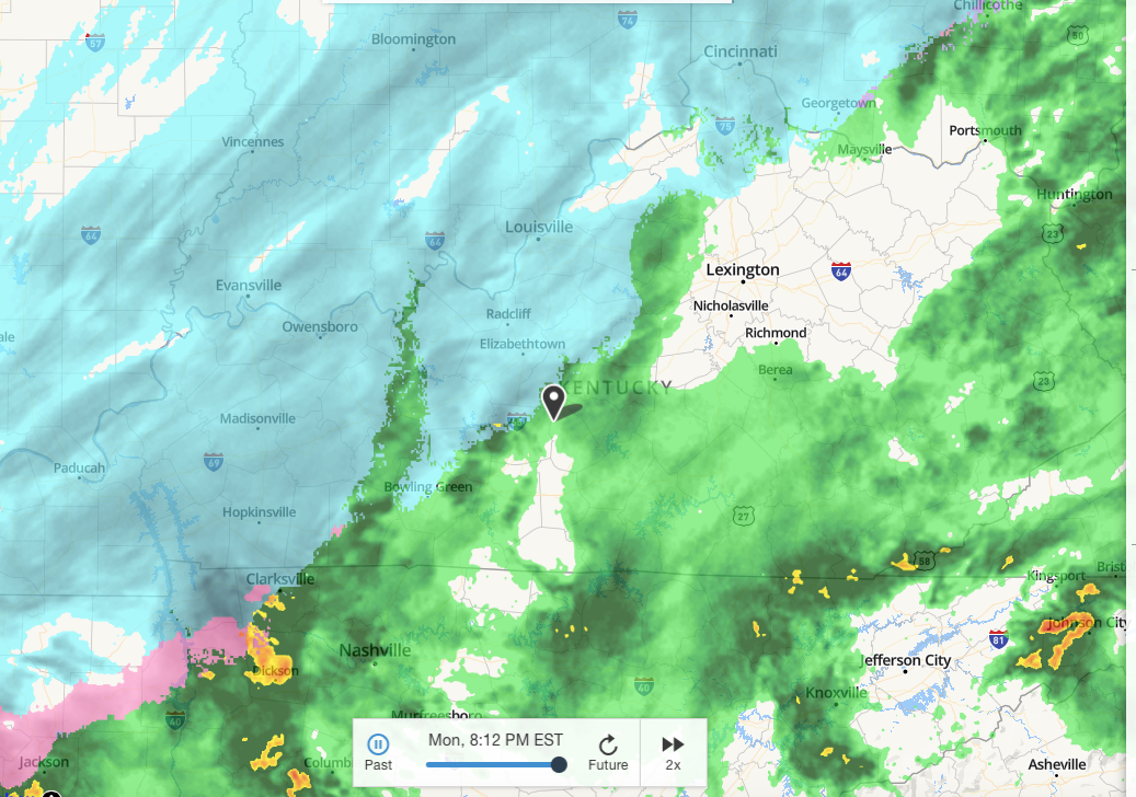 This is the weather for my area right now. The storm is moving north east. Blue is snow, pink is ice, green is rain. The temperature is 35°F and falling rapidly.