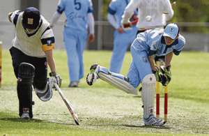 Master S makes the crease before the bails are whipped off the wicket.