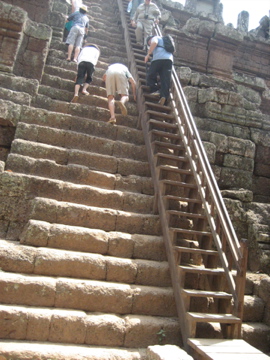 Climbing the Angkor Wat tower takes some guts and stamina. Not much to hold onto and scary of you don't like heights. Coming down is just as scary as the ascent. But worth the view from the top of this ancient city in Cambodia.