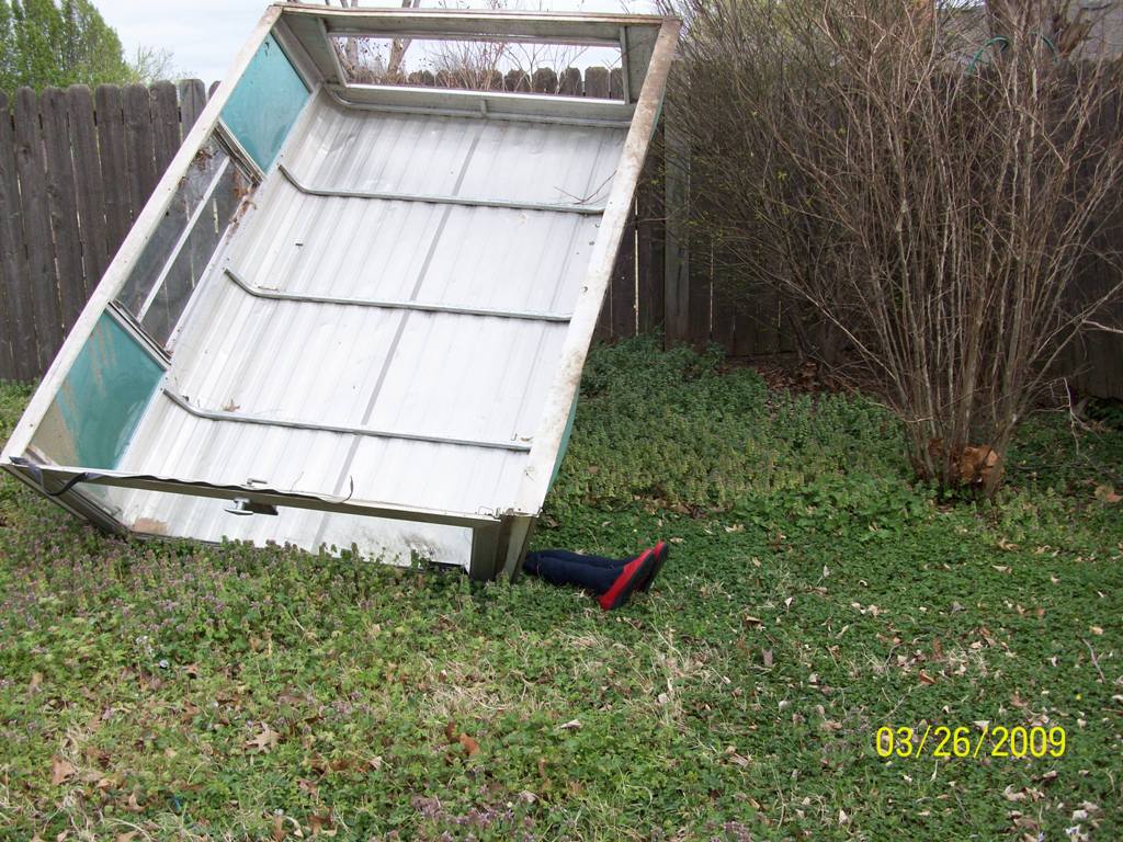 A ferocious thunderstorm rolled through here March 24, blowing my neighbor's camper shell over the 6 foot fence and into my backyard.