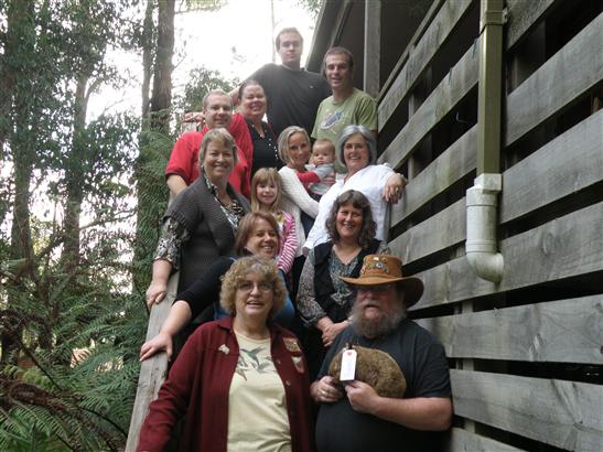 Top to bottom (& left to right when close to the same height), Latchie, Gath, Bean, Steve, Liz, Kym holding Flynn, Kate, Gail, Judy, Lynne and me holding my new Wombat buddy.