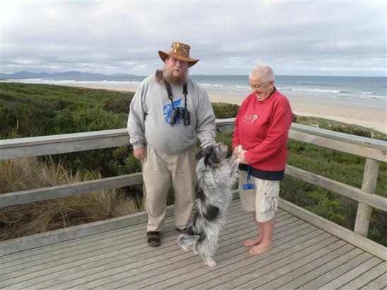 on a boardwalk overlook of the beach just a short walk from her house.