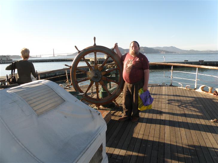 steering the Balclutha. Kathy's skeptical about where I've got it pointed.