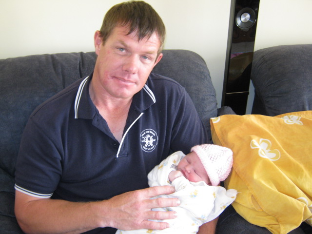 Samiyah at 1 week old with her dad