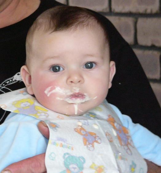 My grandson Bailey enjoying his custard for lunch. He's five and a half months old now.