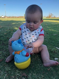 7 months old, playing at the park