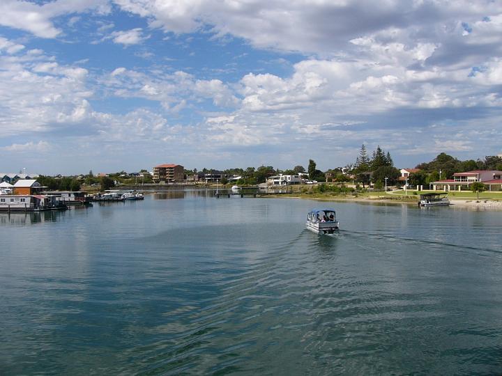 I took this from a foot bridge over the river as the clouds were lovely and the wake from the boat made a lovely peaceful scene