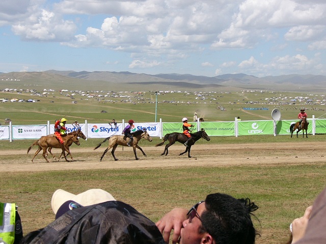 Some of the leaders about to cross the finishing line. We had to wait a few hours for them to get ready so we were lucky we managed to get seats and used our umbrellas as sunshades as it was very hot out in the sun. 