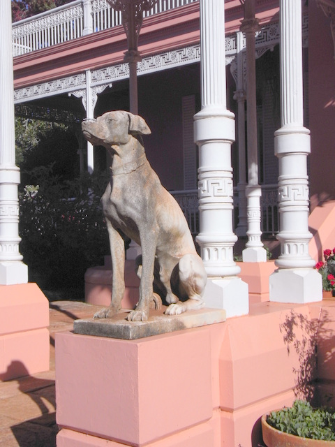 Detail of one of the ''guardians'' on the front steps of the main house