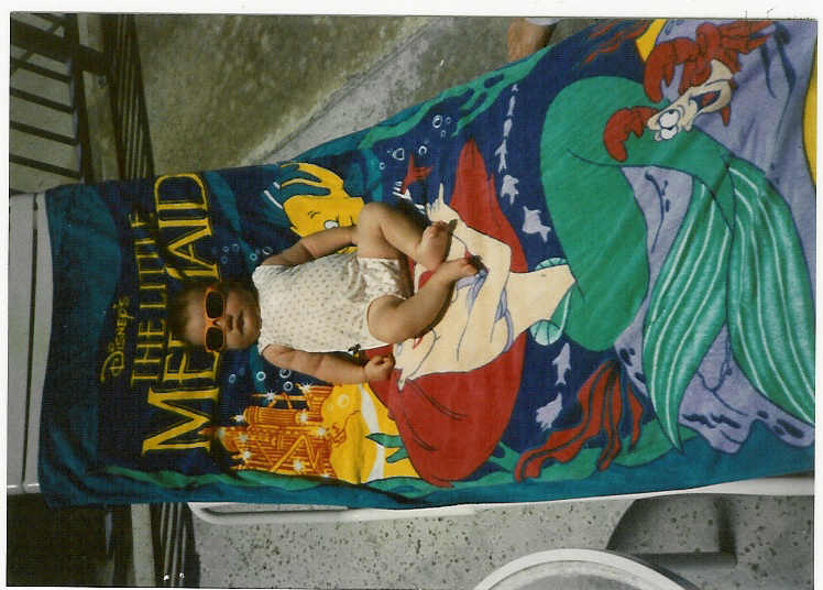 my daughter as a newborn...she's always loved the water...pools an beach