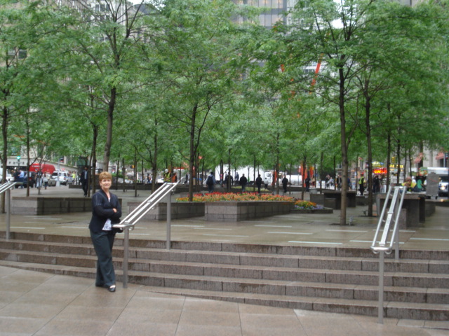 This is Zuccotti Park. I wanted to see all those "Occupy Wall Street" protesters. We could only find one person and he wore a scarf around his face to hide his identity. A local person advised that the police had "persuaded" the protesters to move on.