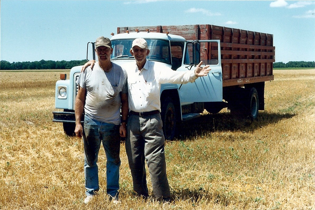 TM and his cousin during harvest.