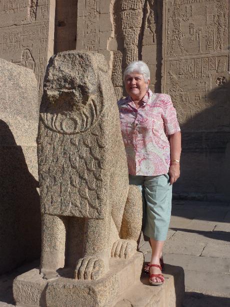 Doing a Keith near damaged lion statue. When the Christians lived in these Temple they disfigured the faces and limbs of the Egyptian Gods