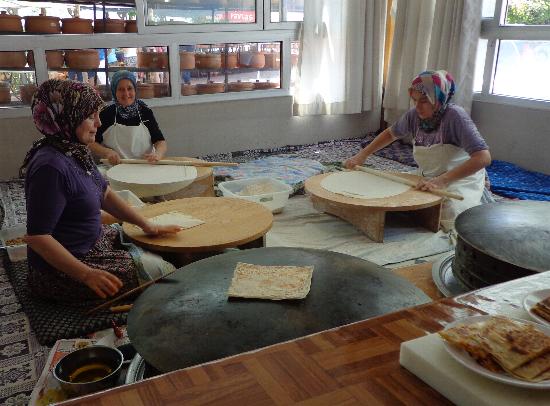 The ladies rolling out the pastry, filling and cooking the gozleme. I like the spinach and cheese ones.