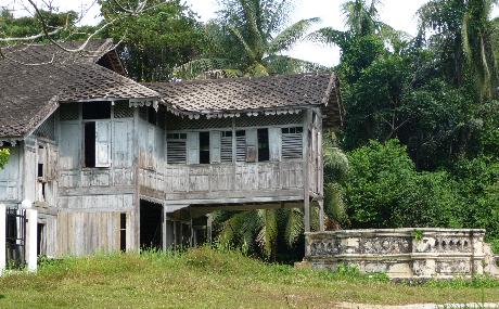 An old style Malay home with lots of shutters