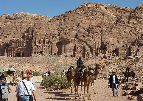 These are the Royal and other Tombs carved into the rock. 