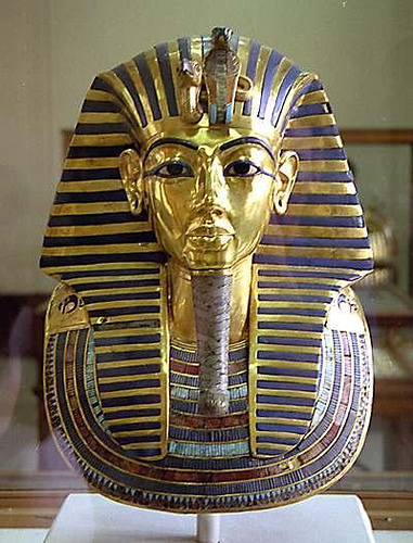 The Golden face mask of King Tut Ang Amoun in Cairo Musium Cairo City Egypt.