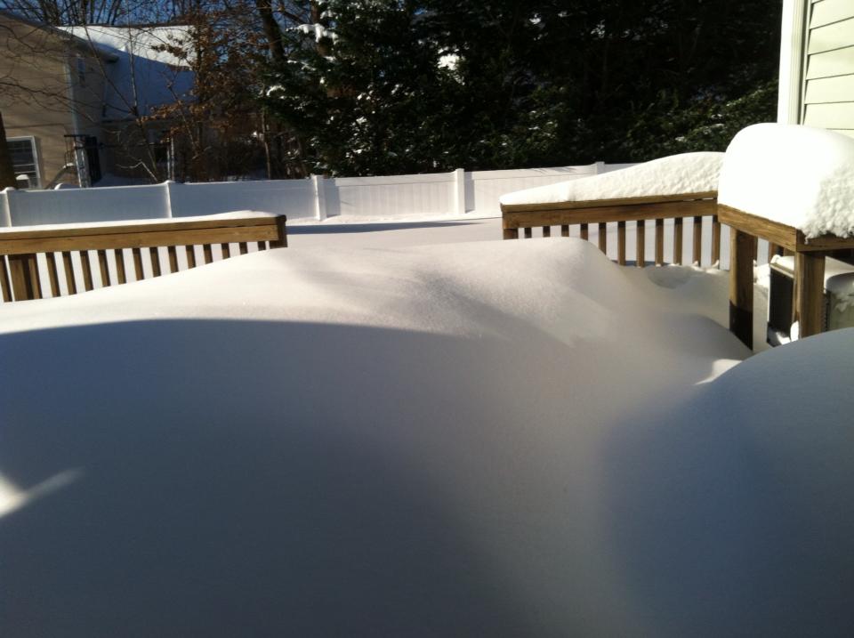 The back deck before we knocked all the overhanging snow off the roof.