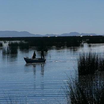 <b>Fisherman of floating islands on Lake Titicaca, Puno, Peru</b>