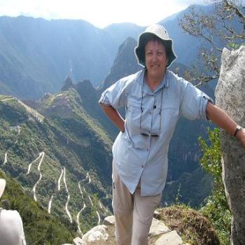 <b>Relief, Inca ruins of Machu Picchu in background, Peru </b>