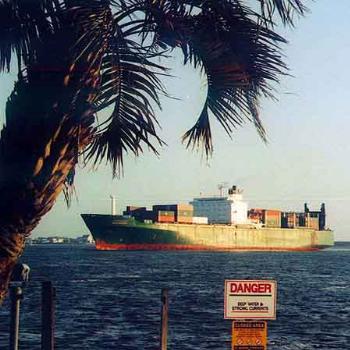 Container ship at the mouth of Cape Fear in Southport NC  \  kay NC