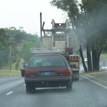 <b>What was Baz doing tailing a log truck in Traralgon mid January?</b>