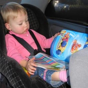 <b>Laura browsing the latest shopping catalogue</b>