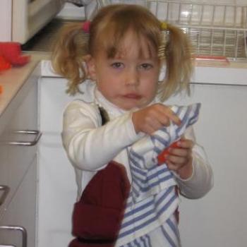 <b>Laura wiping up her dishes</b>