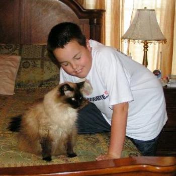 <b>Mason with Sassy the cat  Sue / OK</b>