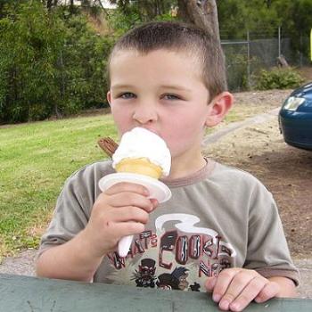 Johnathan eating an icecream nearly as big as him. (Anne/Albany)