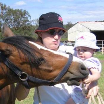 <b>Laura & Sharon patting a horse</b>