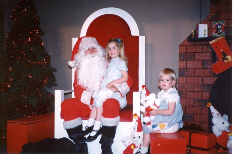 Rachel and Laura meet Santa.  No WAY is Laura going to sit on that old guy's knee!