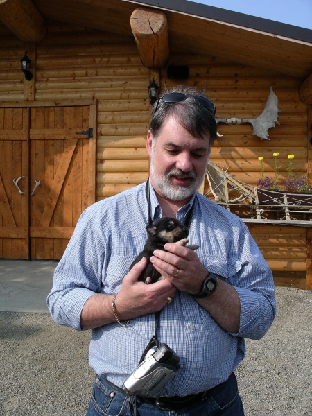 Rob helping to get a husky pup "socialised"