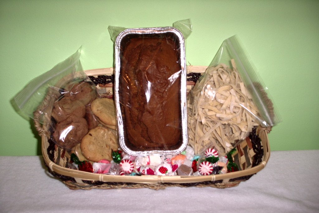 Homemade cookies, pumpkin bread and noodles, surrounded by different candies.