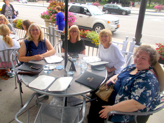 Had a delightful lunch across from Millennium Park in Chicago.  From left:  Plum, me, my friend Brenda and Julie.  Julie's hubby Roger took the photo.