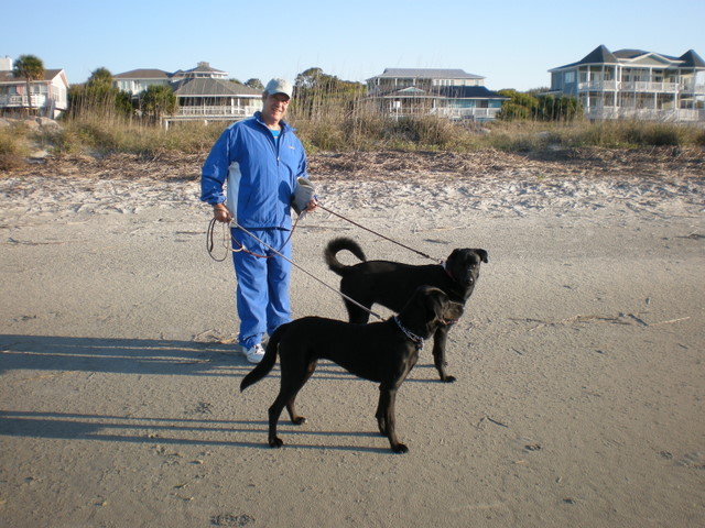 Rob walking Ebony and Sheila (Wanda and Alan's dog) on the beach