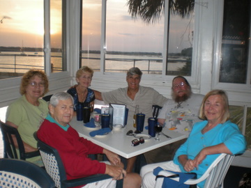 Enjoying a wonderful dinner at 11th Street Dockside Restaurant in Port Royal, SC.  Going around the table clockwise starting with the man in red:  Jaime, Lynne, Kathy, Rob, Keith and Jane