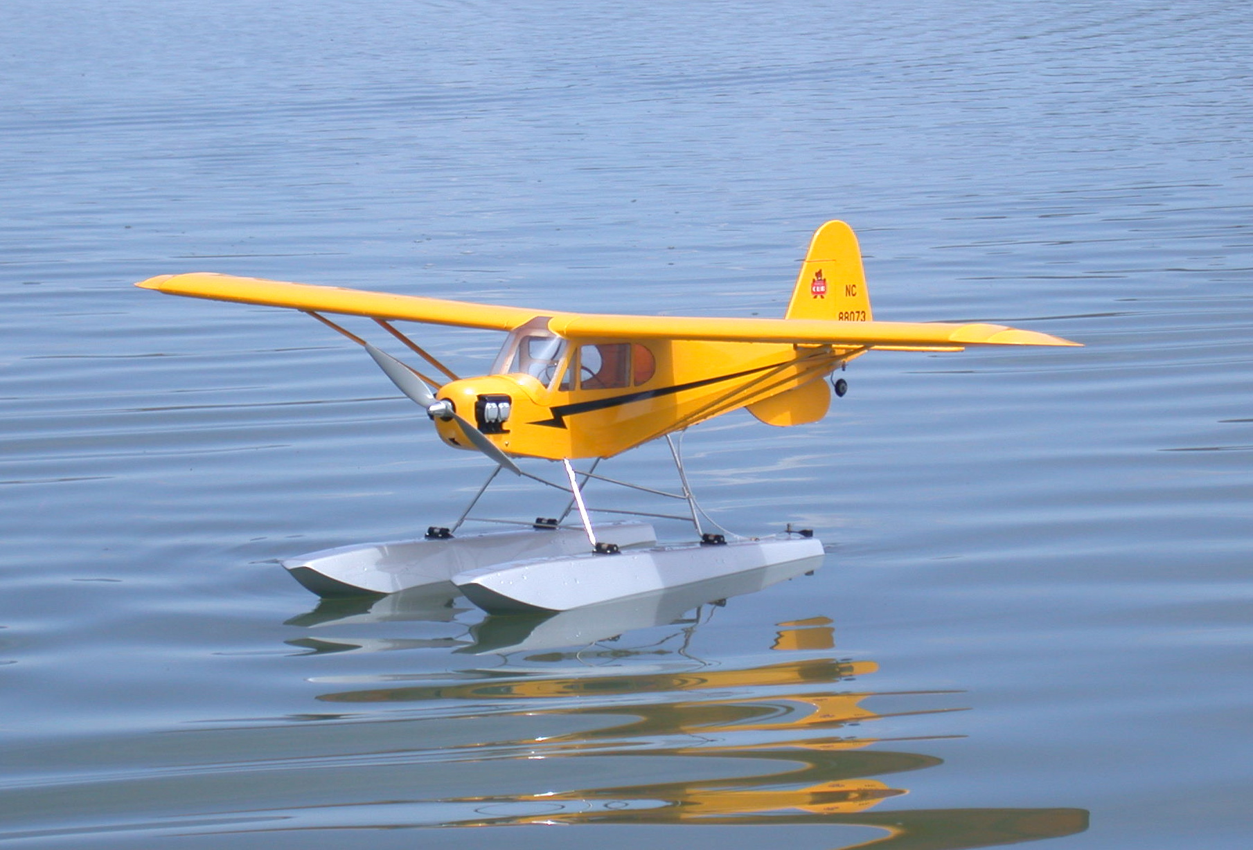 This is my 25 size electric powered J3 Cub on floats.