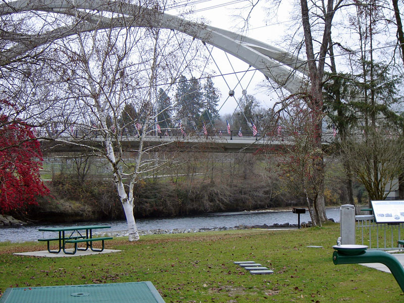 Citizens of Rogue River remember: The date that lives in infamy - over 100 flags line both sides of the bridge.