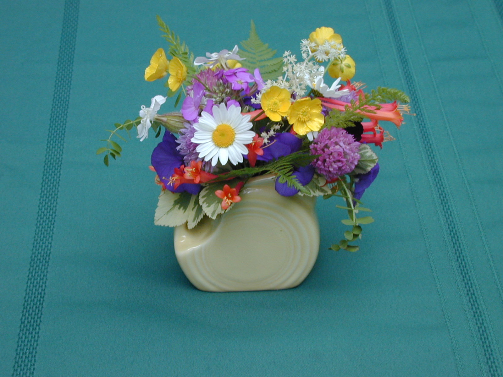 A sample mini floral arrangement.  It's a hobby of mine -- I have several dozen small vases.