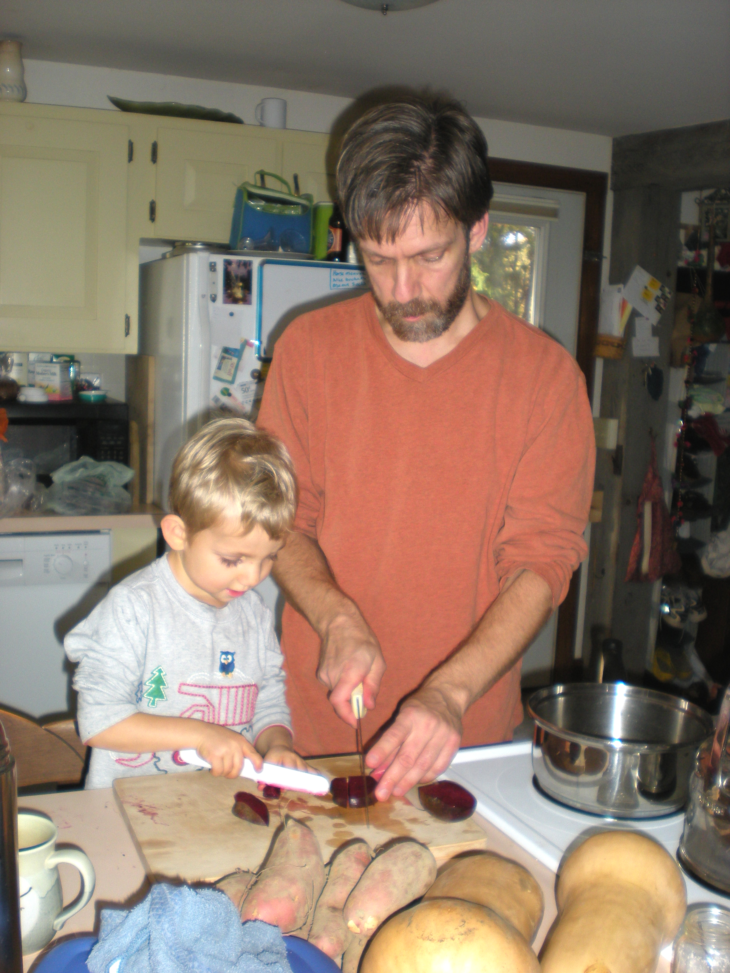 Son Mark and grandson Galen enjoy cooking together.  They are chopping beets in this photo (Galen has plastic knife.)