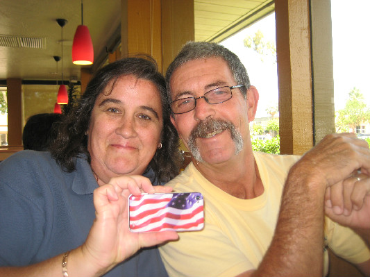 Kathi (aka Katitude) and Robert with their American flag iPhone cover