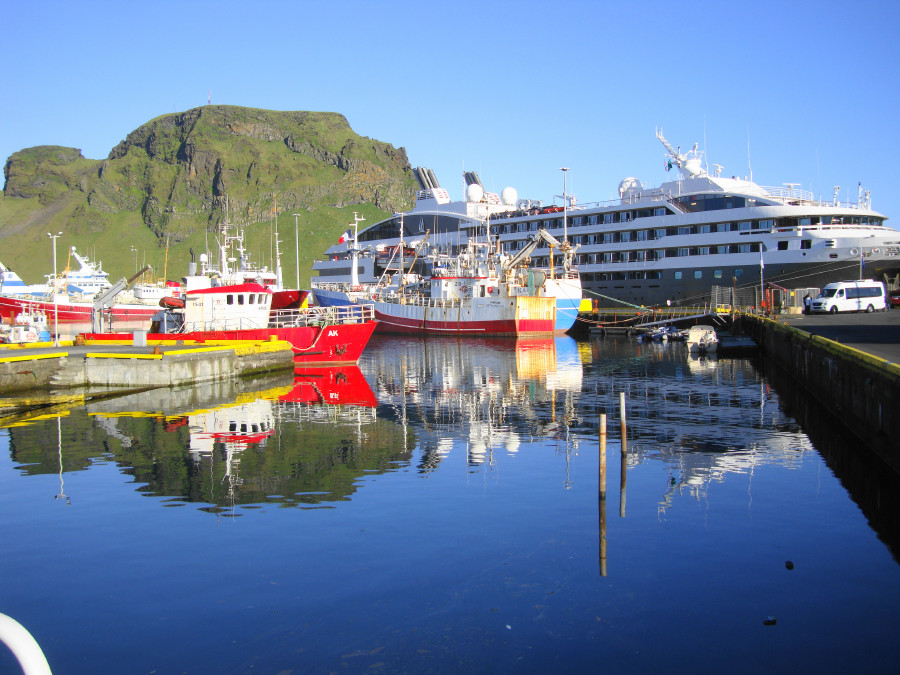 Day 7: Vestmannaeyjar is a group of small islands off the south coast of Iceland. Heimaey Island (and town) is the largest of these islands.
The reflection in the harbour intrigued me.