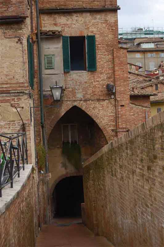 Italy - One of the streets in Siena - not easy for cars to pass but they do!