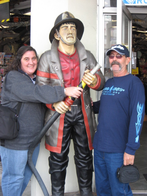 A real fire engine was driving by us as our Aussie guests posed with this statue. The engineer couldn't stop laughing after seeing Kathi grab that fire dude's hose!