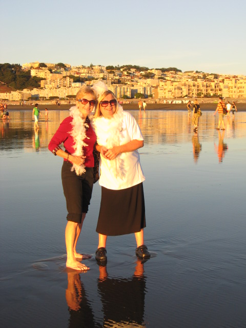 Kathy and Jane getting their tootsies wet in the Pacific Ocean.